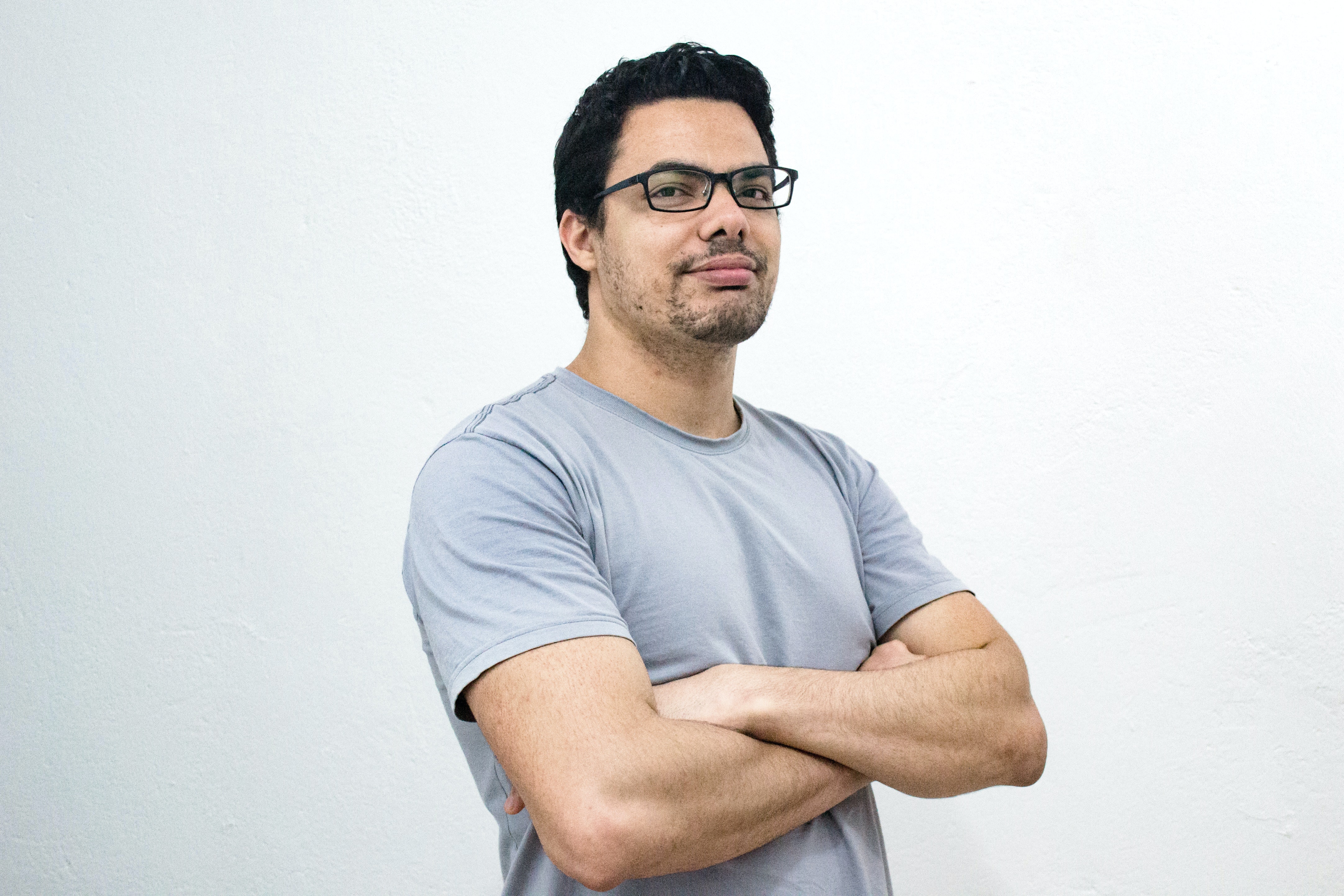 man with crossed arms